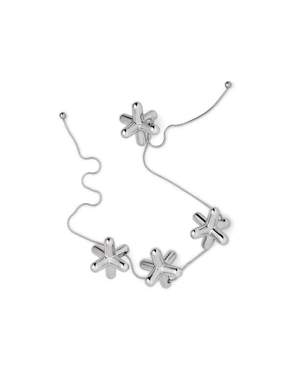 Alessi — Tripod GCH01 | Dessous-de-plat en zamak chromé — Alessi