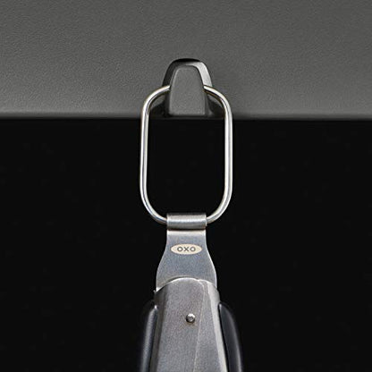OXO Pinze Good Grips in acciaio inox con estremità frastagliate e apribottiglie integrato