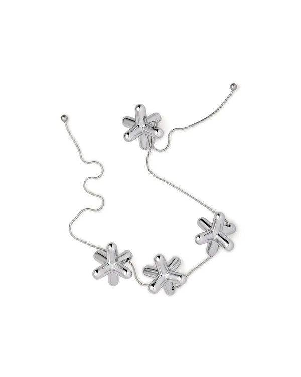 Alessi — Tripod | Dessous-de-plat design Clé — Alessi
